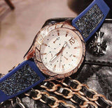  Shop Authentic Guess Swirl Analog Quartz White Dial Blue Rubber Strap Watch for Women - W1096L4 - Luxxuri