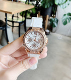  Shop Authentic Guess Confetti Crystal Rose Gold Dial White Silicone Strap Watch For Women - W1098L5 - Luxxuri