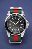  Shop Authentic Gucci Dive Black Dial Two Tone NATO Strap Watch For Men - YA136206 - Luxxuri