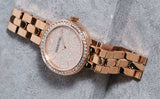  Shop Authentic Swarovski Daytime Analog Gold Dial Gold Steel Strap Watch for Women - 5182231 - Luxxuri