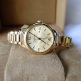  Shop Authentic Burberry The Classic Champagne Dial Gold Steel Strap Watch for Women - BU10109 - Luxxuri