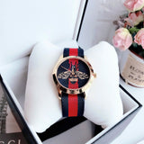  Shop Authentic Gucci G Timeless Bee Red & Blue Dial Red Two Tone Nylon Strap Watch For Men - YA1264061 - Luxxuri