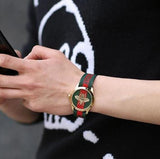  Shop Authentic Gucci Le Marche des Merveilles Green & Red Dial Green & Red NATO Strap Unisex Watch - YA126487 - Luxxuri