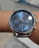  Shop Authentic Hugo Boss Gregor Chronograph Blue Dial Silver Mesh Bracelet Watch For Men - 1514052 - Luxxuri
