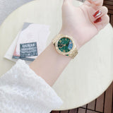  Shop Authentic Guess Cosmo Diamonds Green Dial Gold Steel Strap Watch for Women - GW0033L8 - Luxxuri
