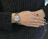  Shop Authentic Calvin Klein Dainty White Dial Gold Steel Strap Watch for Women - K7L23546 - Luxxuri