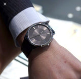  Shop Authentic Calvin Klein Minimal Grey Dial Black Leather Strap Watch for Men - K3M221C4 - Luxxuri