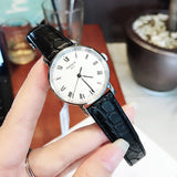  Shop Authentic Tissot Everytime Small White Dial Black Leather Strap Watch For Women - T109.210.16.033.00 - Luxxuri