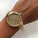 Shop Authentic Burberry The Classic Champagne Dial Gold Steel Strap Watch for Women - BU10109 - Luxxuri