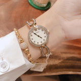  Shop Authentic Bulova Crystal Collection Mother of Pearl Dial Gold Steel Strap Watch for Women - 98L225 - Luxxuri