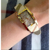  Shop Authentic Burberry Pioneer Gold Dial Haymarket Beige Leather Strap Watch for Women - BU9509 - Luxxuri