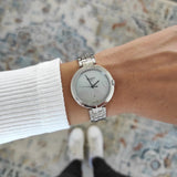Tissot T-Lady Flamingo Diamonds Mother of Pearl Dial SIlver Steel Strap Watch for Women - T094.210.11.116.02