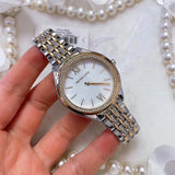  Shop Authentic Michael Kors Mindy Three Hand White Dial Two Tone Steel Strap Watch For Women - MK7084 - Luxxuri