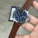  Shop Authentic Tommy Hilfiger Asher Chrongraph Blue Dial Brown Leather Strap Watch For Men - 1791855 - Luxxuri