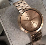  Shop Authentic Michael Kors Garner Quartz Rose Gold Dial Rose Gold Steel Strap Watch For Women - MK6409 - Luxxuri