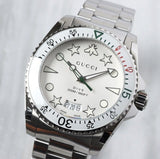  Shop Authentic Gucci Dive Quartz White Dial Silver Steel Strap Watch For Men - YA136336 - Luxxuri