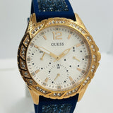  Shop Authentic Guess Swirl Analog Quartz White Dial Blue Rubber Strap Watch for Women - W1096L4 - Luxxuri