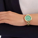  Shop Authentic Swarovski Daytime Crystals Turquoise Dial Gold Steel Strap Watch for Women - 5182212 - Luxxuri