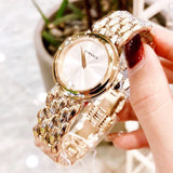  Shop Authentic Versace V-Flare Quartz Silver Dial Gold Steel Strap Watch for Women - VEBN00718 - Luxxuri