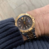  Shop Authentic Versace Hellenyium GMT Black Dial Two Tone Steel Strap Watch for Men - V11040015 - Luxxuri