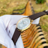  Shop Authentic Calvin Klein Minimal White Dial Brown Leather Strap Watch for Men - K3M216G6 - Luxxuri