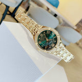  Shop Authentic Guess Cosmo Diamonds Green Dial Gold Steel Strap Watch for Women - GW0033L8 - Luxxuri